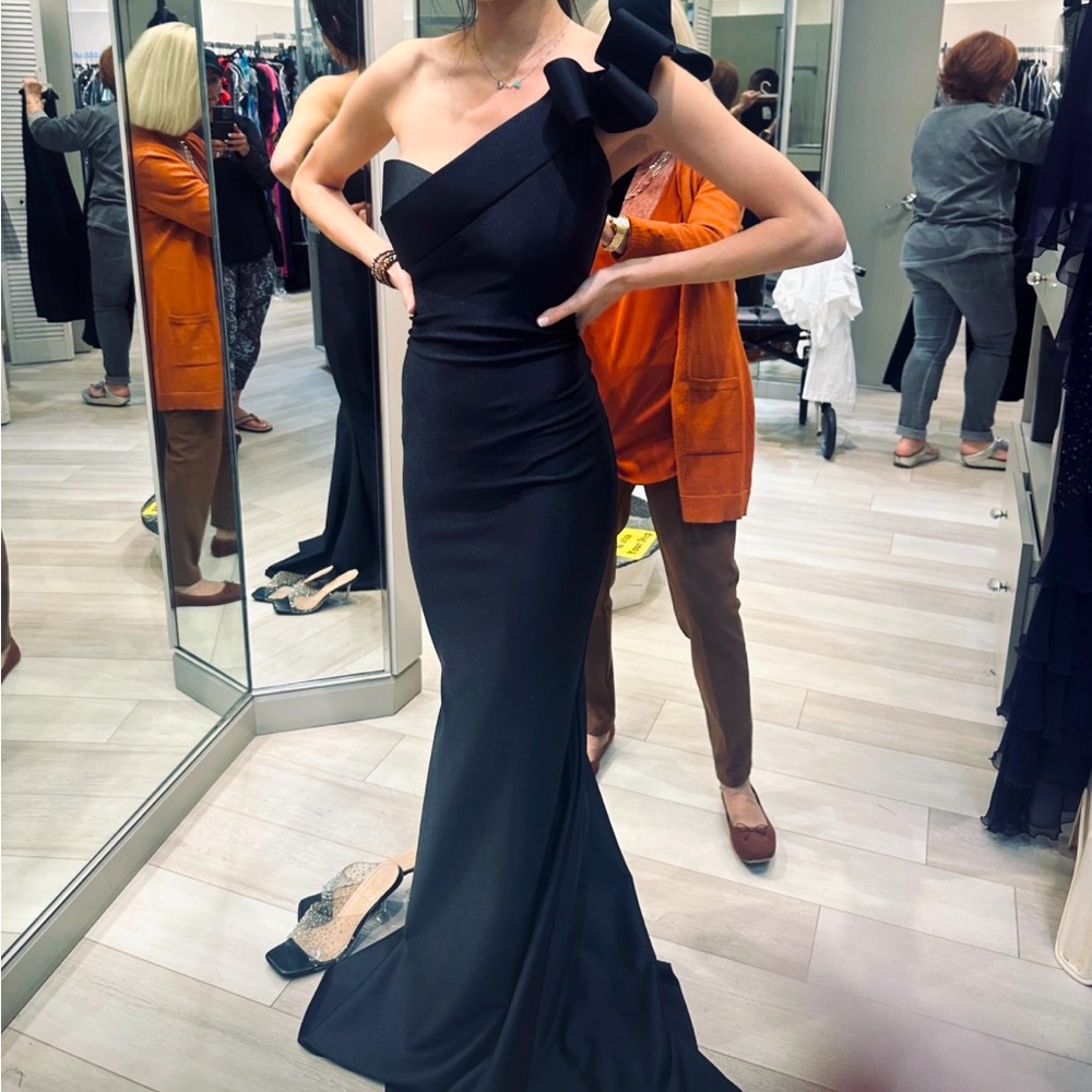 Never worn- Woman’s one shoulder gown